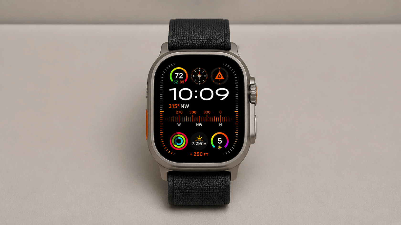Apple watch ultra 2 showing compass and activity data on screen with time 1009 on neutral background