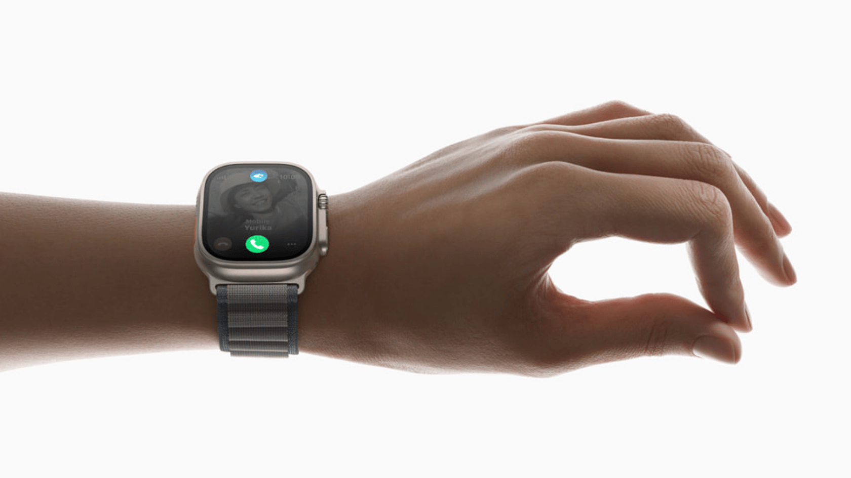 Hand wearing smartwatch with call screen displayed, wrist raised against white background